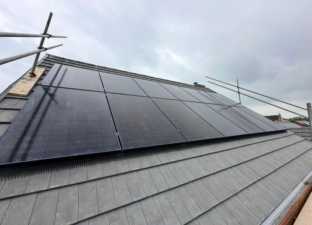 Solar panels installed on house roof.