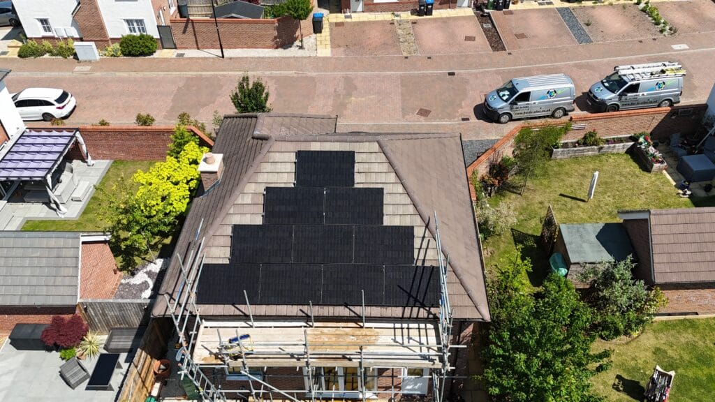 Aerial view of rooftop solar panels installation.