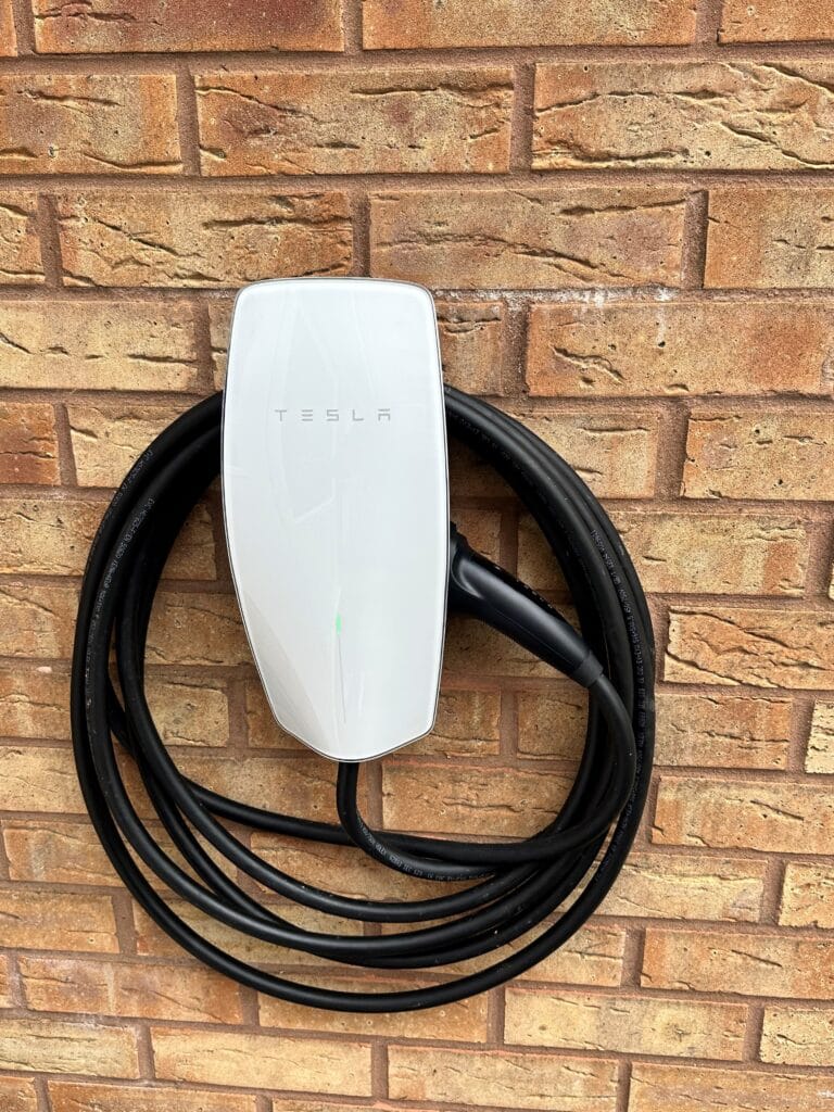 Wall-mounted Tesla electric vehicle charger